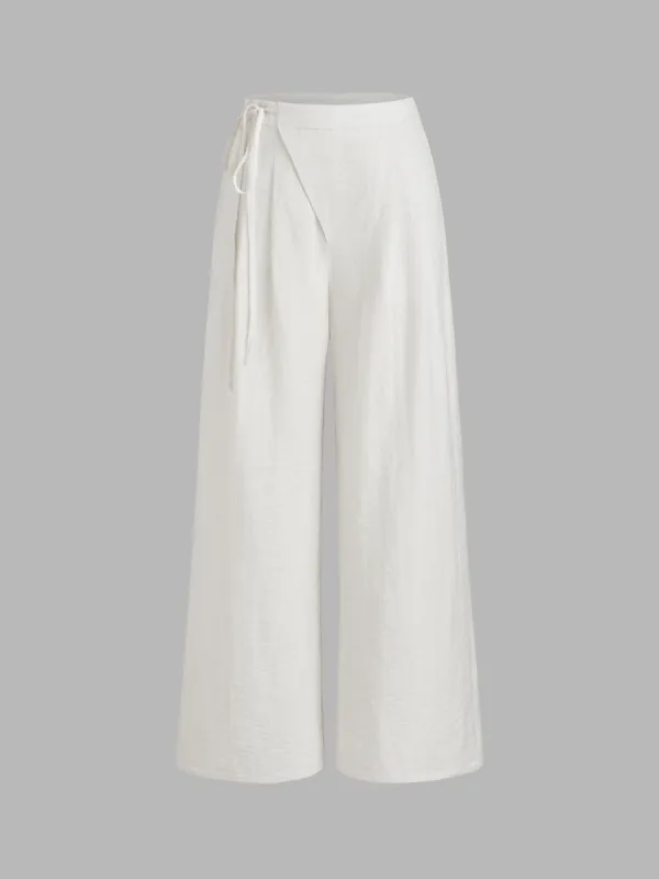 Linen-blend Mid Rise Solid Knotted Pocket Wide Leg Trousers  sold by Cider
