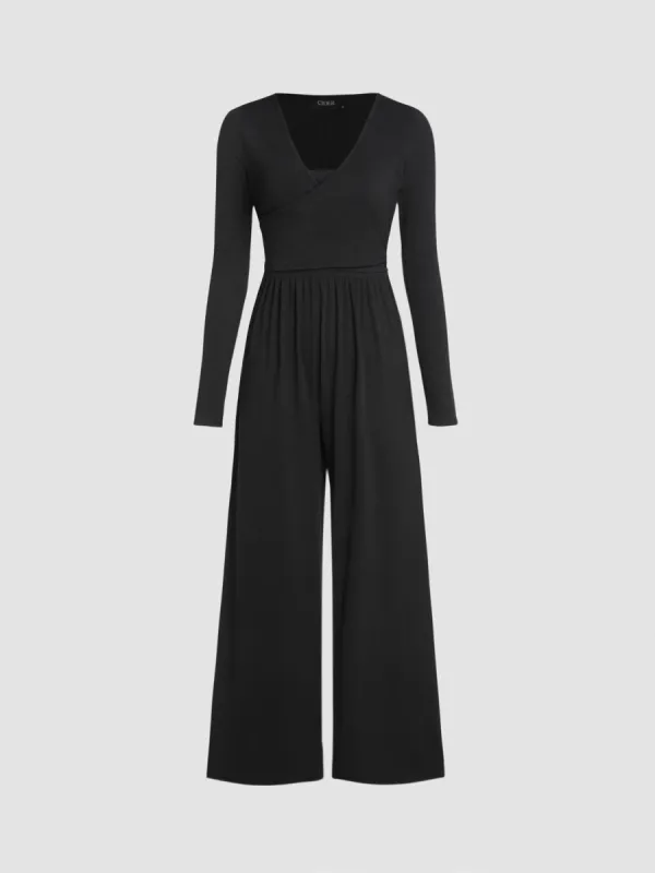 Solid V-neck Wide Leg Jumpsuit sold by Cider