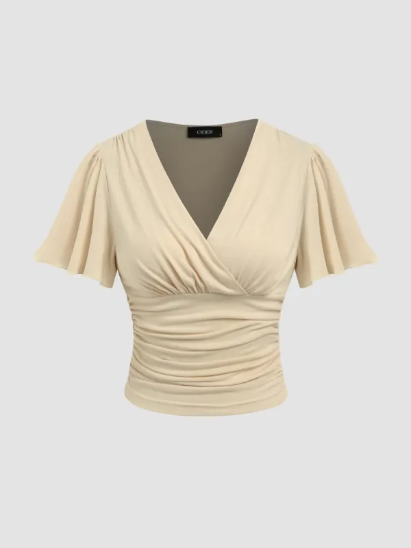 V-neck Ruched Wrap Short Sleeve Top sold by Cider