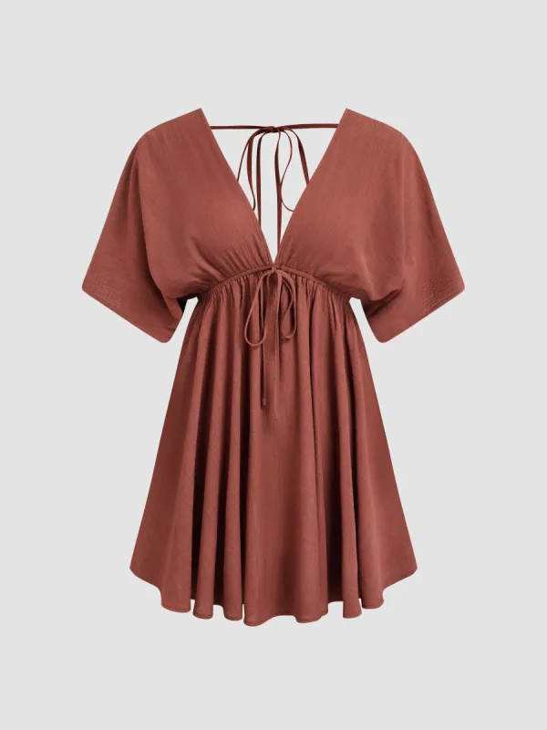 V-neck Ruffle Hem Backless Knotted Middle Sleeve Mini Dress sold by Cider