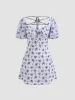 Mesh Square Neck Floral Criss Cross Mini Dress sold by Cider
