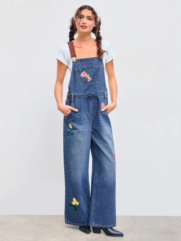 Denim Solid Flower & Butterfly Applique Buckle Up Pocket Jumpsuit sold by Cider