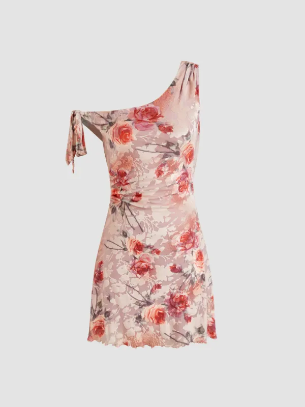 Mesh Asymmetrical Neck Floral Ruched Knotted Mini Dress sold by Cider