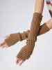 KNITTED FINGERLESS GLOVES sold by Cider