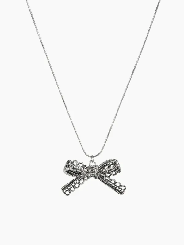  RHINESTONE DECOR BOW PENDANT NECKLACE sold by Cider