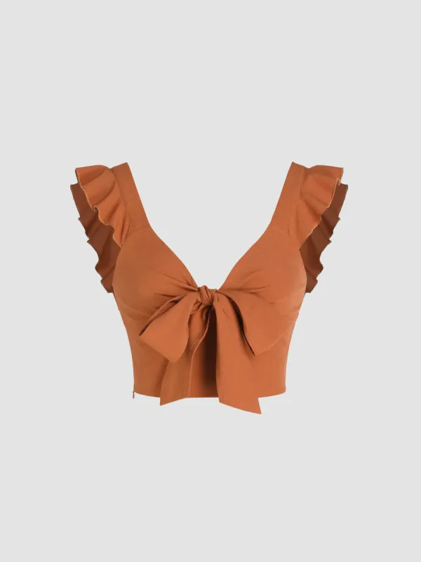 Solid V-neck Ruffle Knotted Crop Top sold by Cider