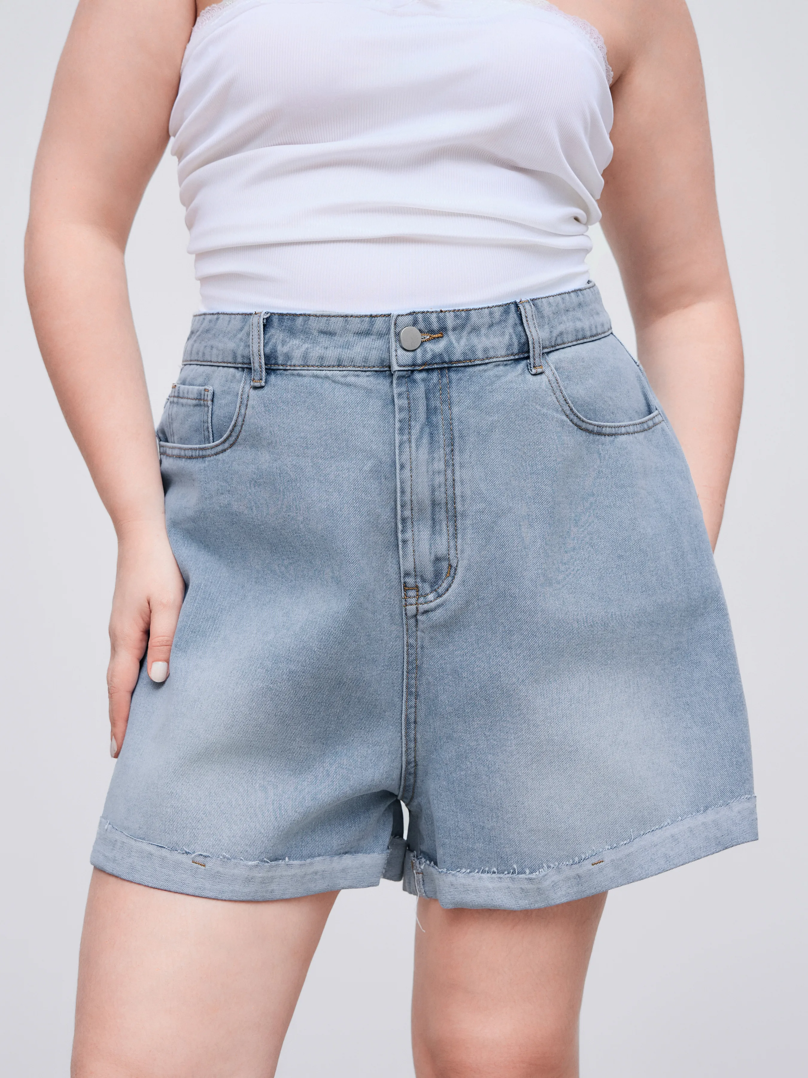 Denim Mid Rise Solid Pocket Roll Hem Shorts Curve & Plus sold by Cider