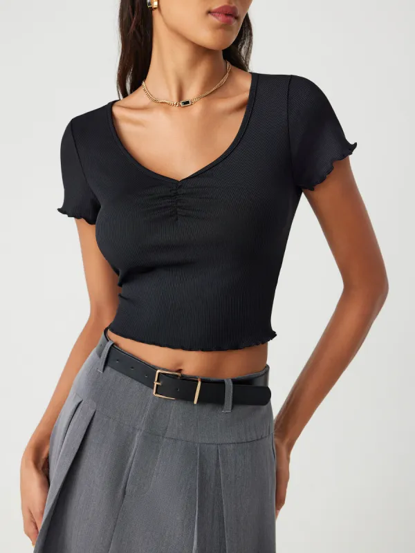 Solid V-neck Ruched Crop Tee sold by Cider