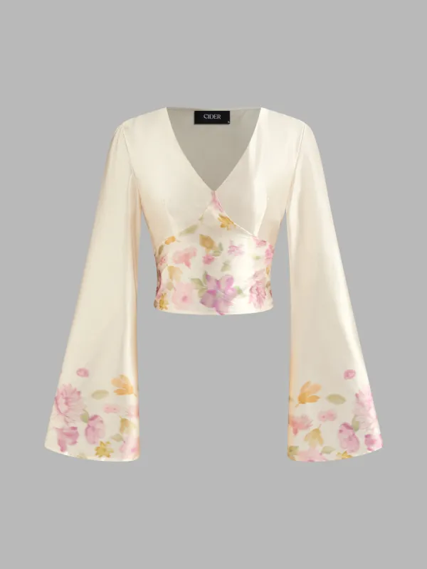 V-neck Floral Knotted Crop Long Sleeve Blouse sold by Cider