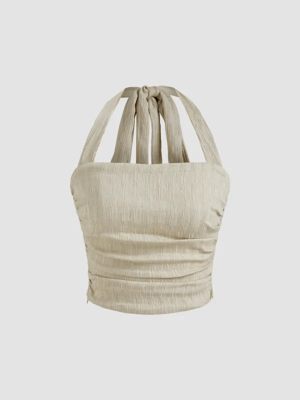 Halter Neckline Solid Texture Ruched Crop Top sold by Cider