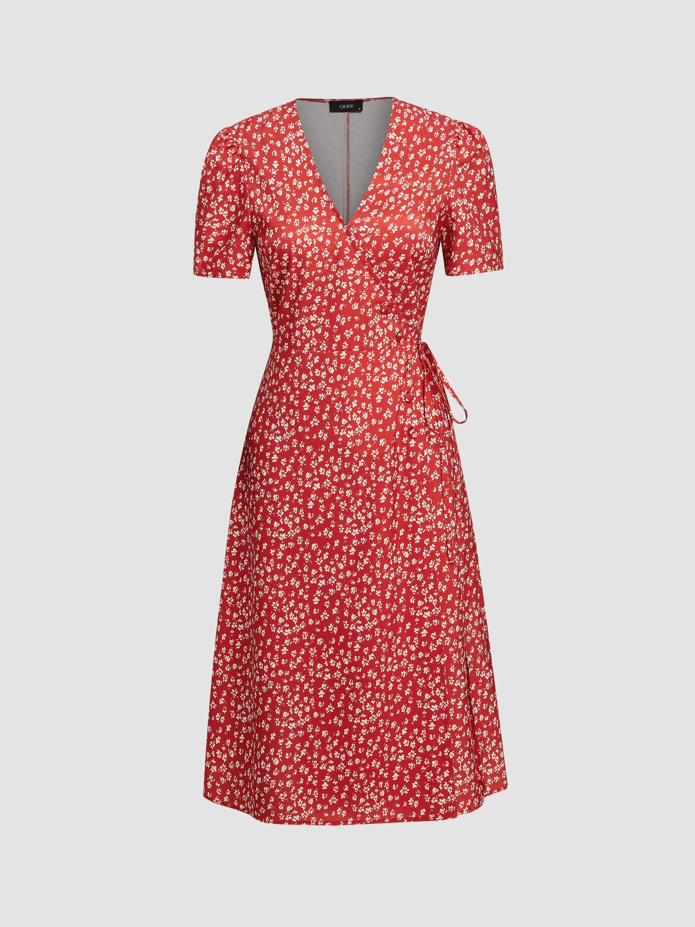 V-neck Ditsy Floral Knotted Midi Dress sold by Cider