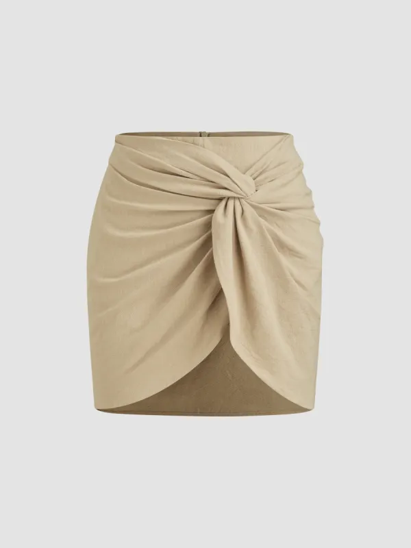 Woven Mid Rise Solid Twist Mini Skirt sold by Cider