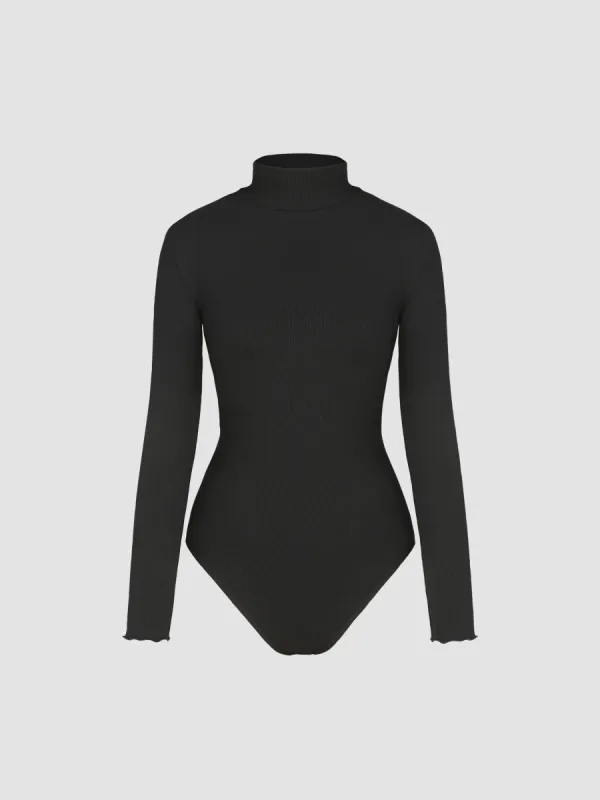 Solid Turtleneck Bodysuit sold by Cider