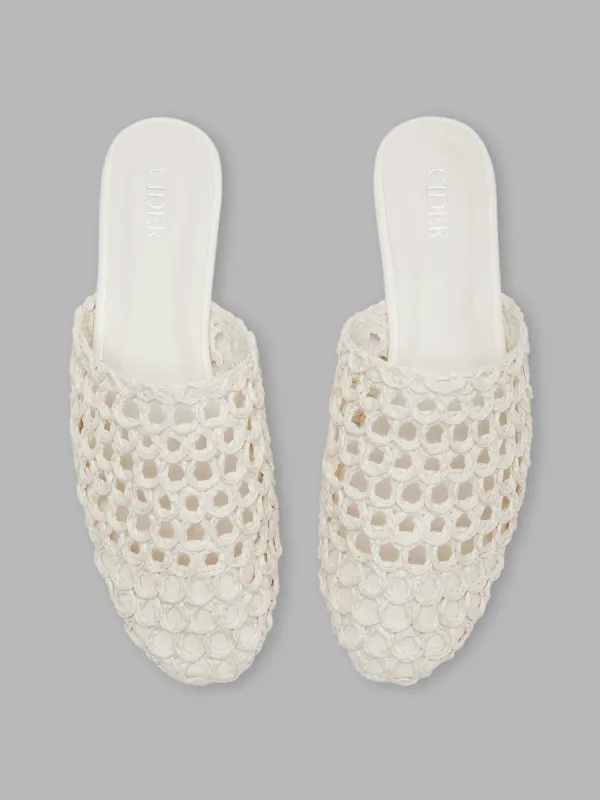 WOVEN MULE FLATS sold by Cider