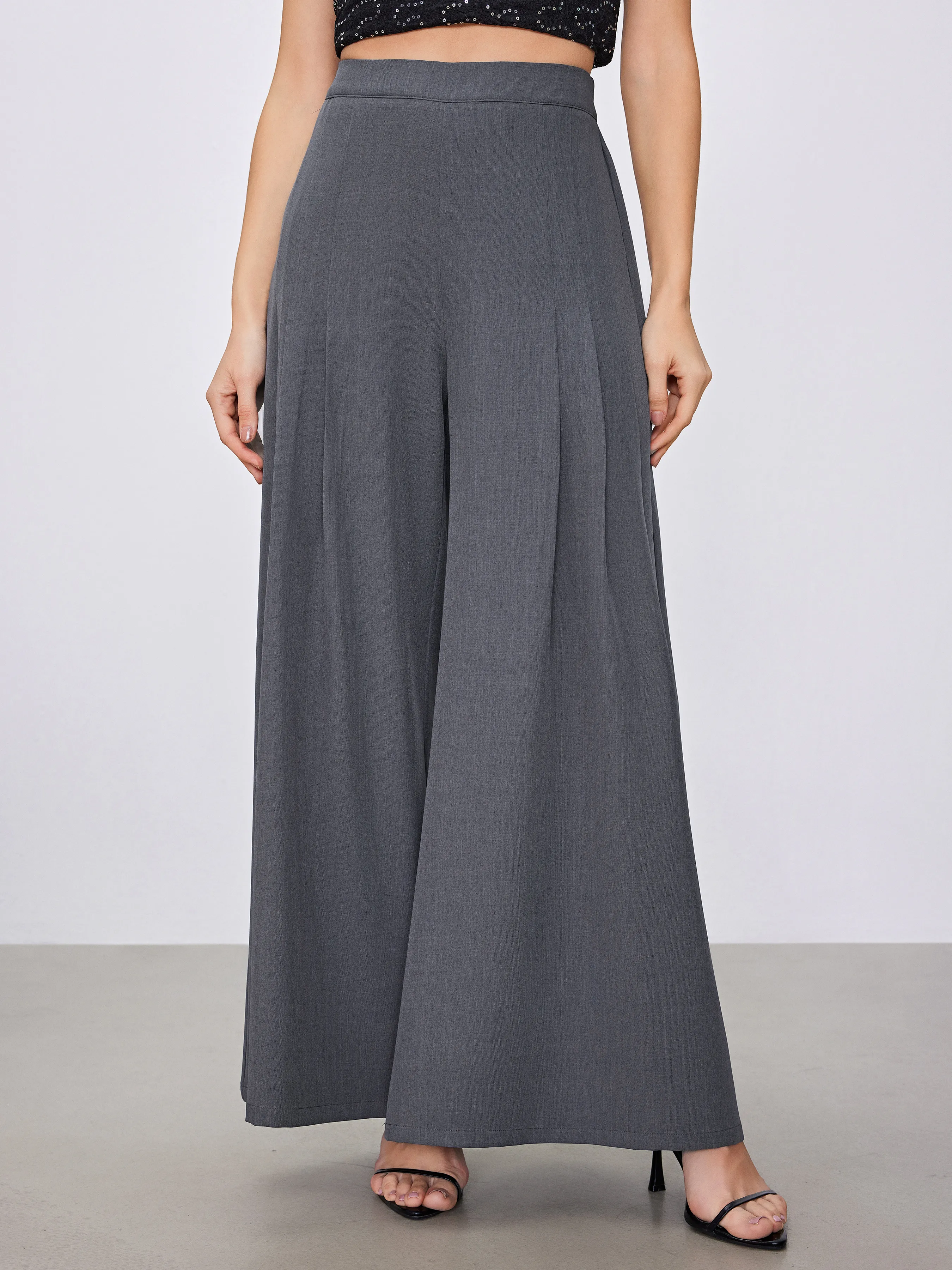 Woven Mid Rise Wide Leg Trousers sold by Cider