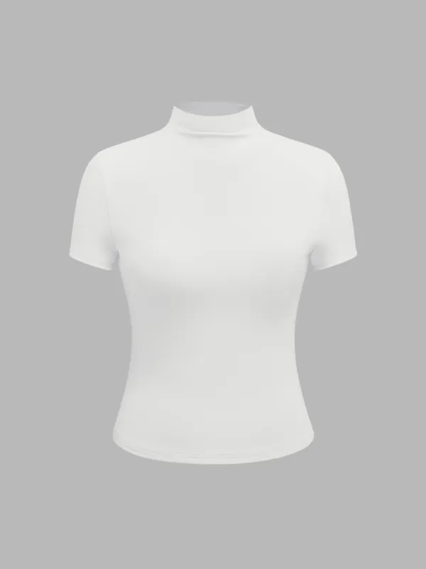 Contour Double Layered Turtle Neck Solid Short Sleeve Top sold by Cider