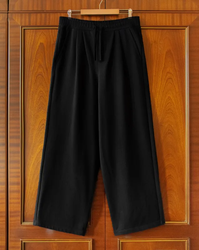 PLEATED JOGGERS IN BLACK made by House of Errors