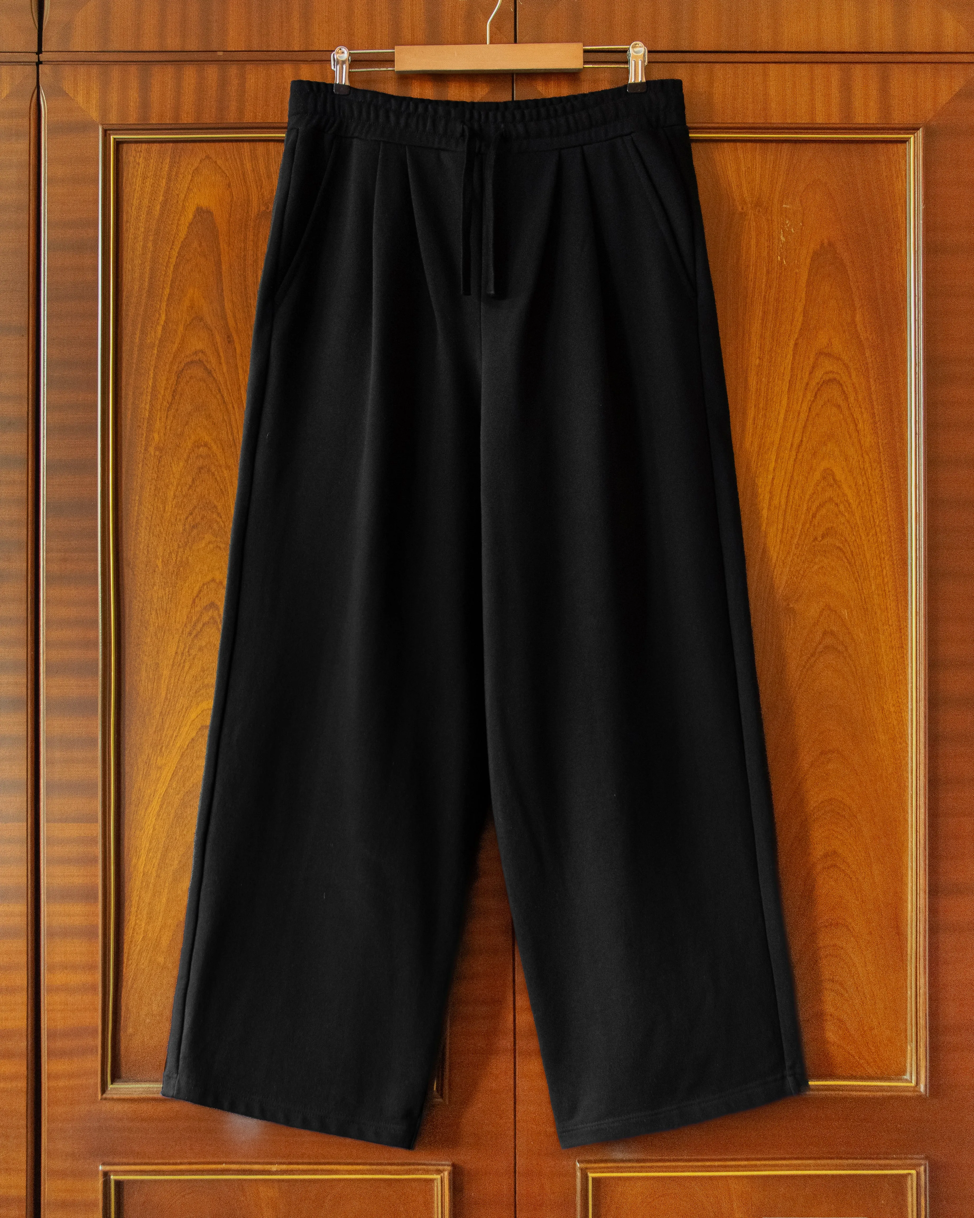 PLEATED JOGGERS IN BLACK sold by House of Errors