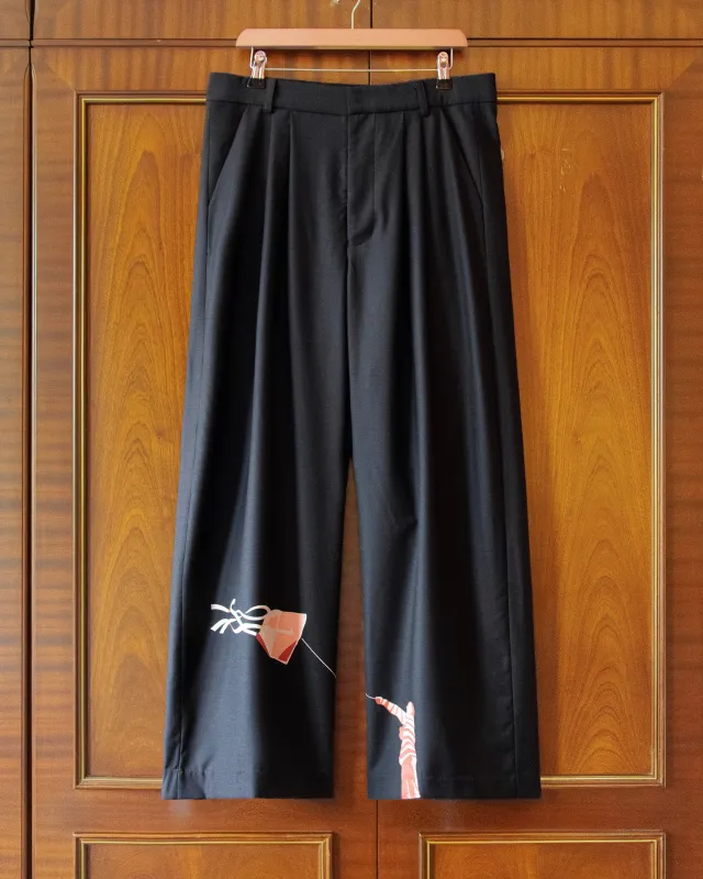 PLEATED WOOL KITE TROUSERS IN BLACK made by House of Errors