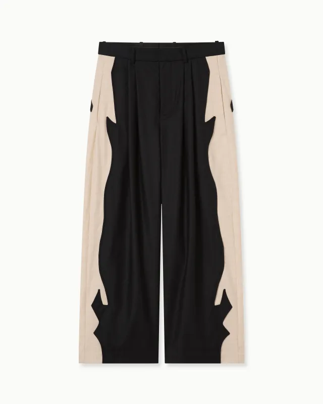 NOIR PANELLED WOOL TROUSERS made by House of Errors