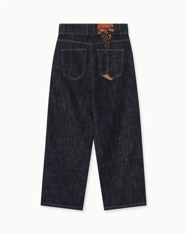 CRUMBLING PATCH JEANS made by House of Errors