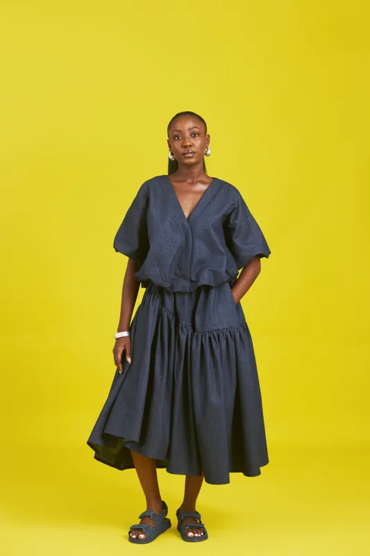 Amaka denim top sold by Folklore Shop