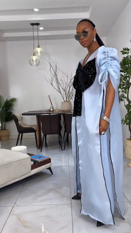 Blue kimono with black bow sequin and wide leg pant set. sold by Folklore Shop