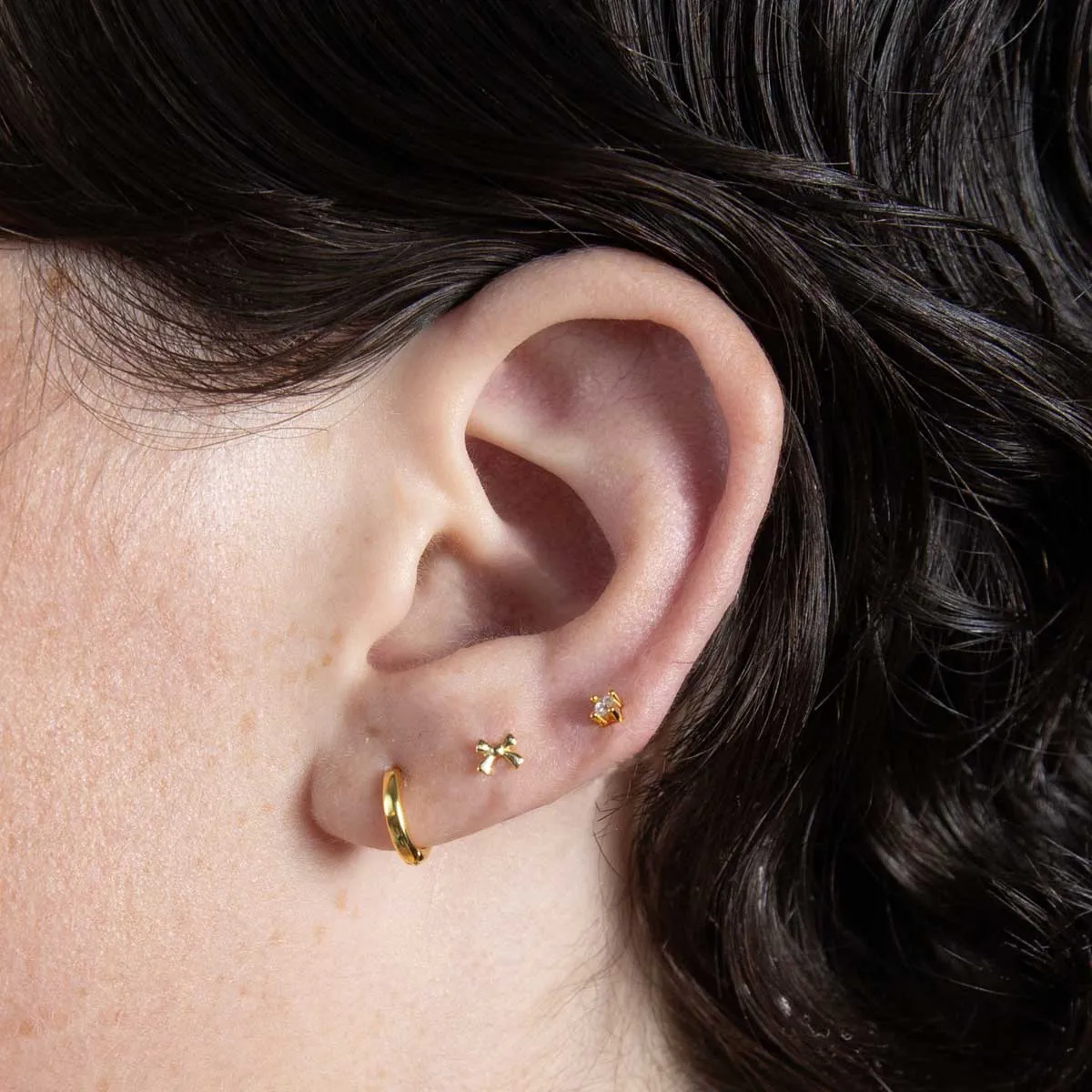 Micro Bow Stud Sterling Silver Earring Stud sold by Folklore Shop product image thumbnail 5