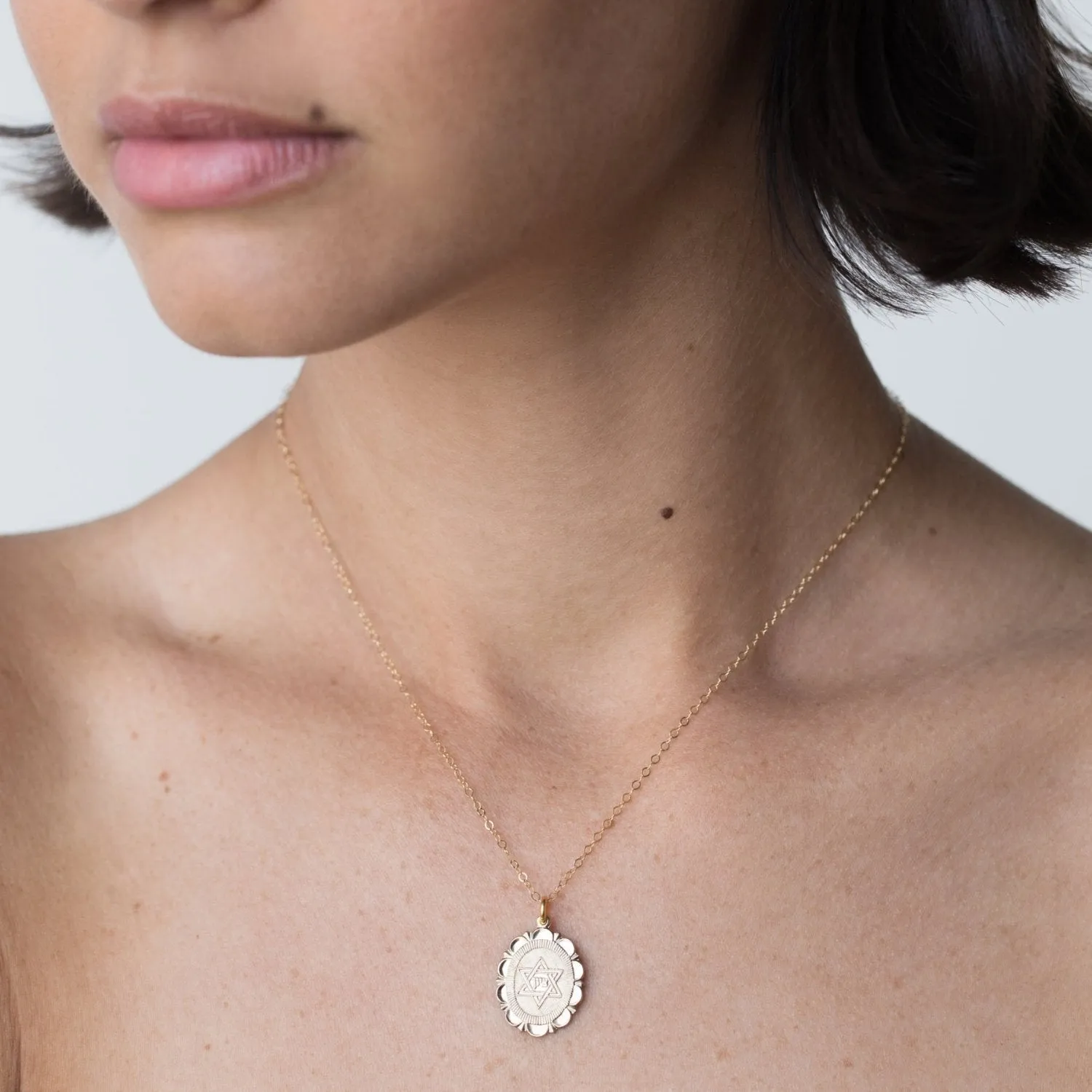 Star of David Charm Necklace sold by Folklore Shop