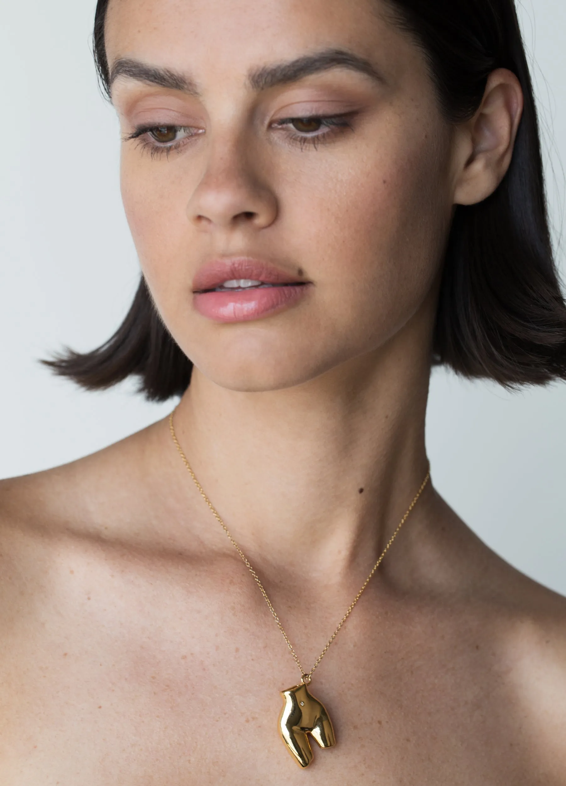 Figure Charm Gold Necklace sold by Folklore Shop product image thumbnail 2