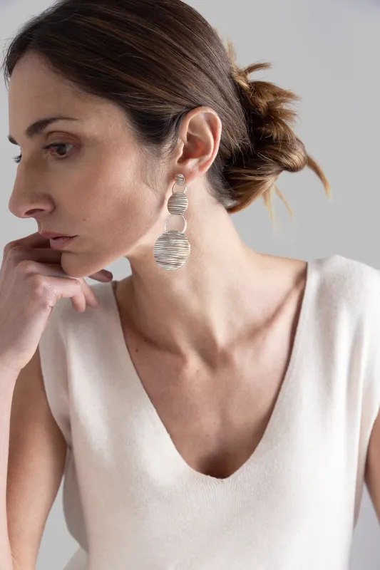 NEW SUN earrings sold by Folklore Shop