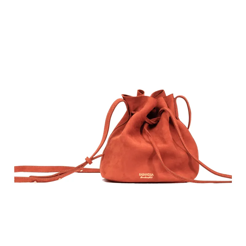 Courtesy Suede Crossbody Bag sold by Folklore Shop
