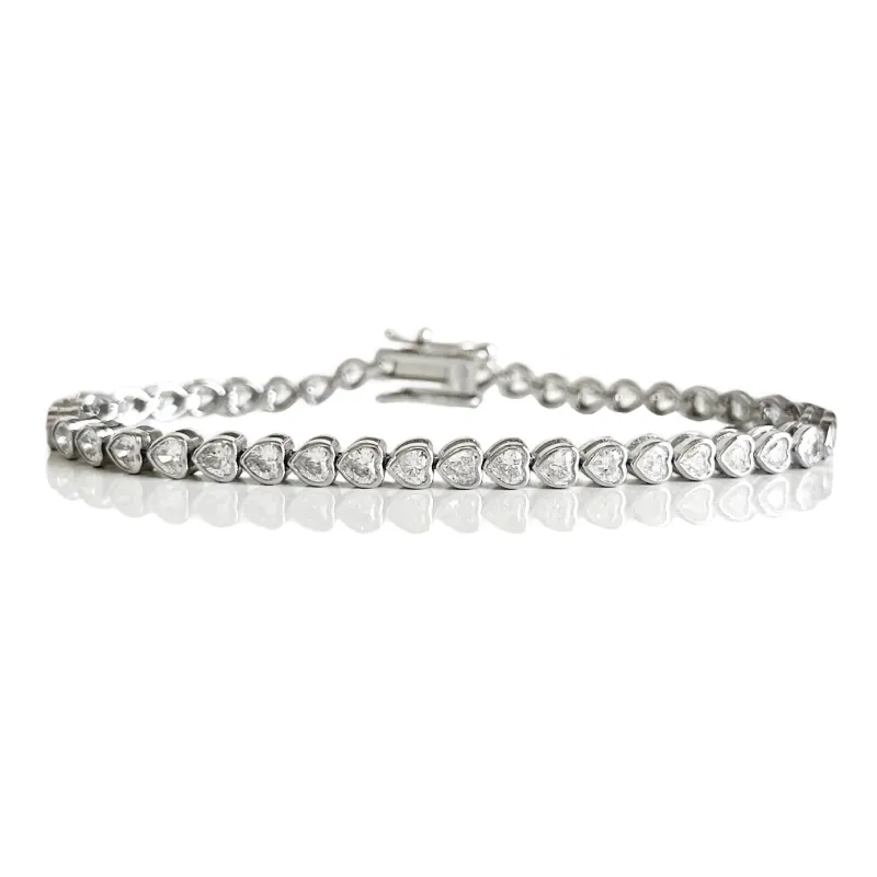 THE “MARIE” HEART BEZEL TENNIS BRACELET sold by Folklore Shop