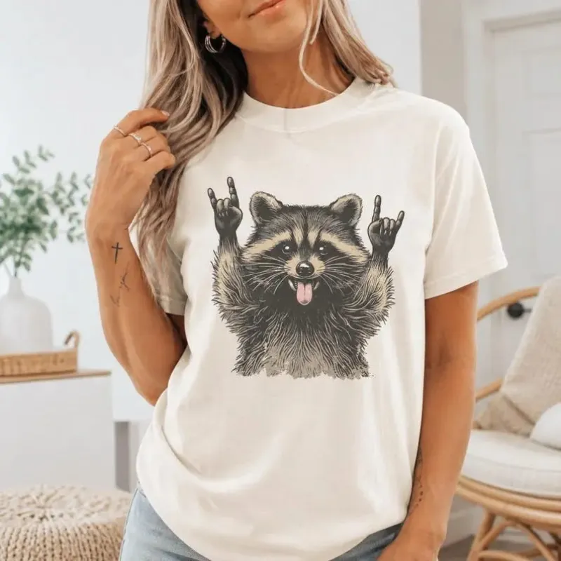 Rock On Raccoon Graphic T-Shirt | Ivory Sarcastic Trash Panda Cotton Tee made by Folklore Shop