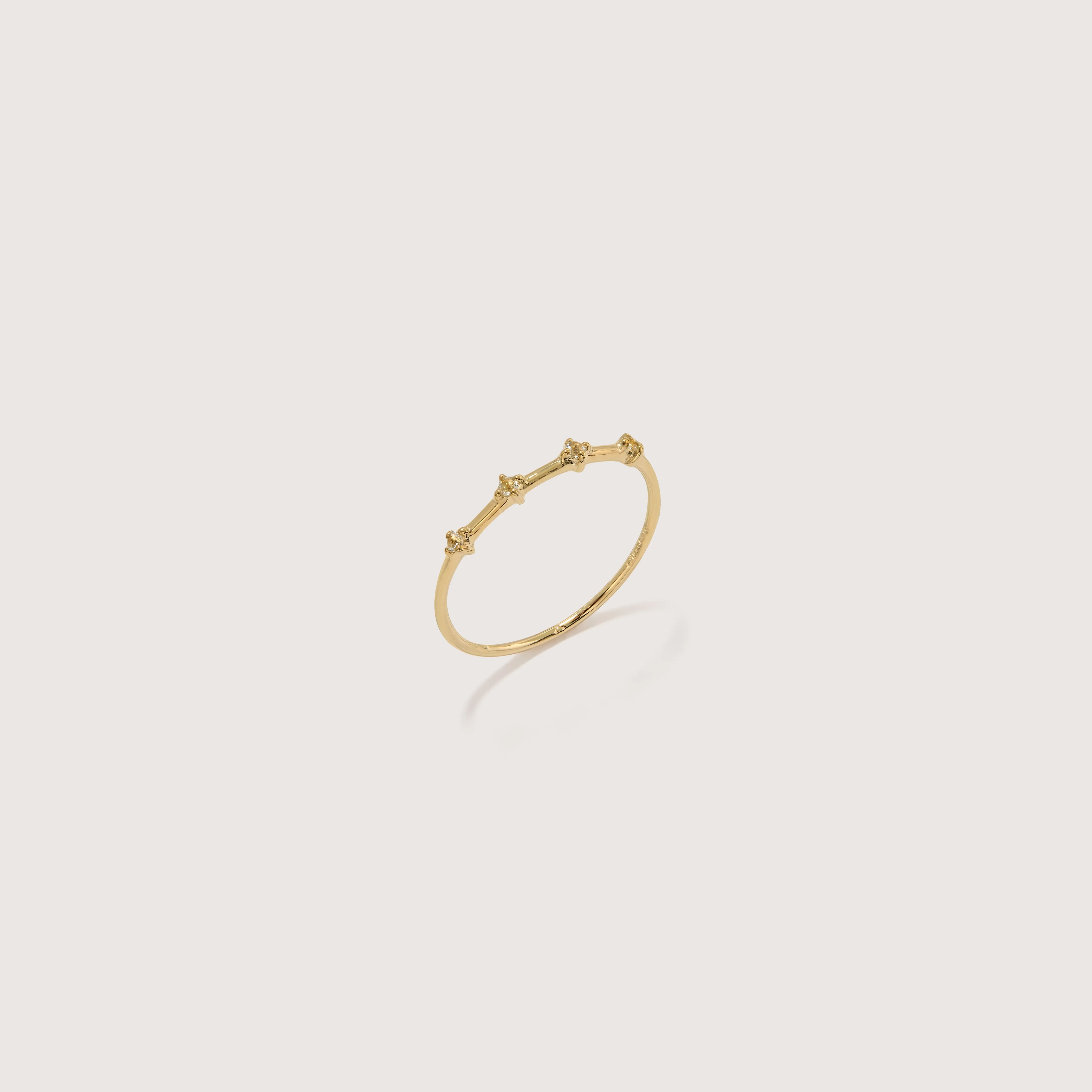 Four Stone Bamboo Ring sold by Otiumberg