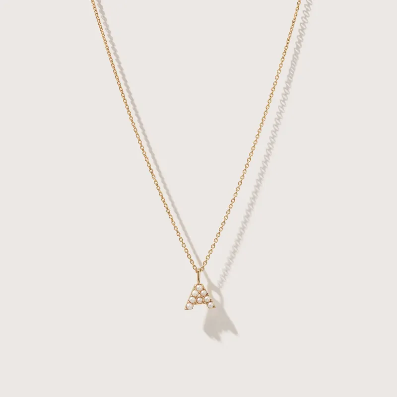 Pearl Initial Pendant sold by Otiumberg