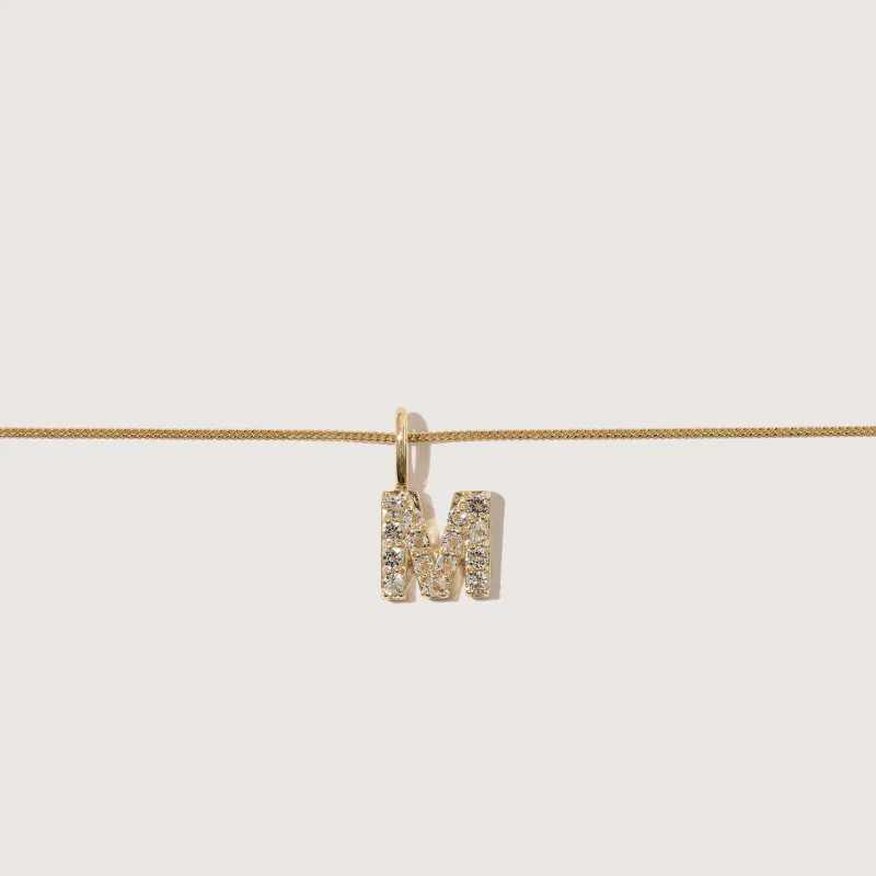 White Topaz Initial Pendant made by Otiumberg