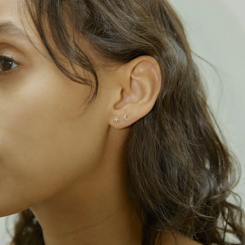 Diamond Star & Moon Stud Set sold by Otiumberg