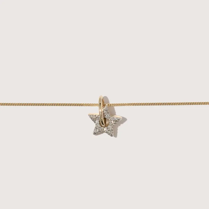 Tiny Diamond Star Necklace sold by Otiumberg