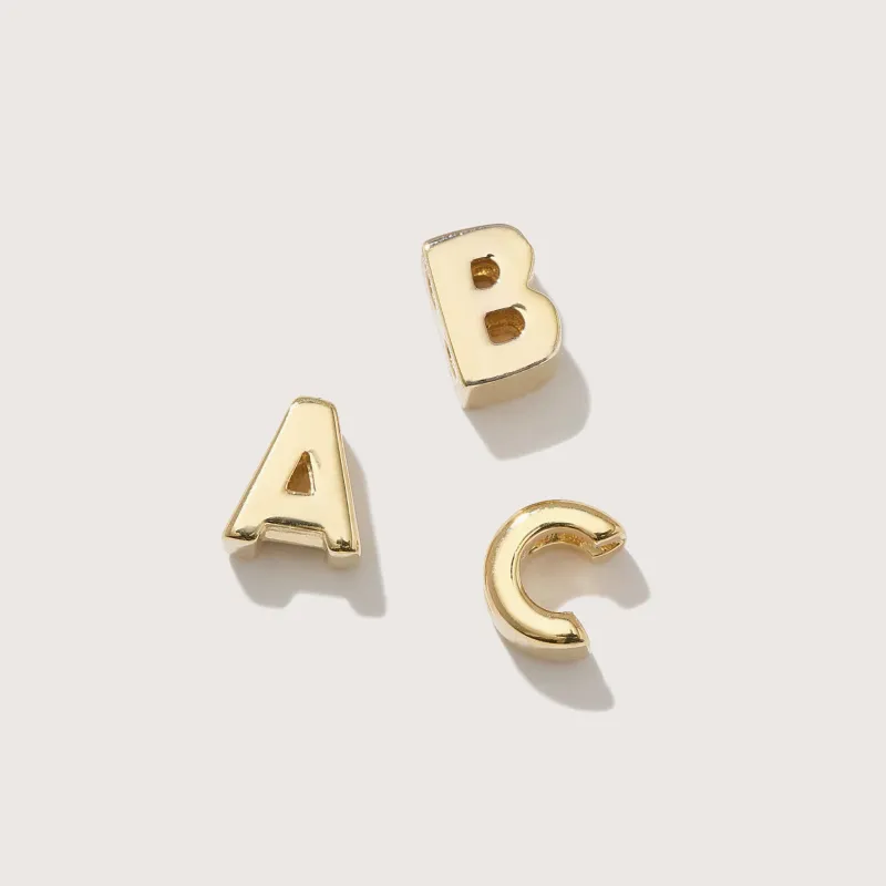 Totem Alphabet Charm (Solid Gold) sold by Otiumberg