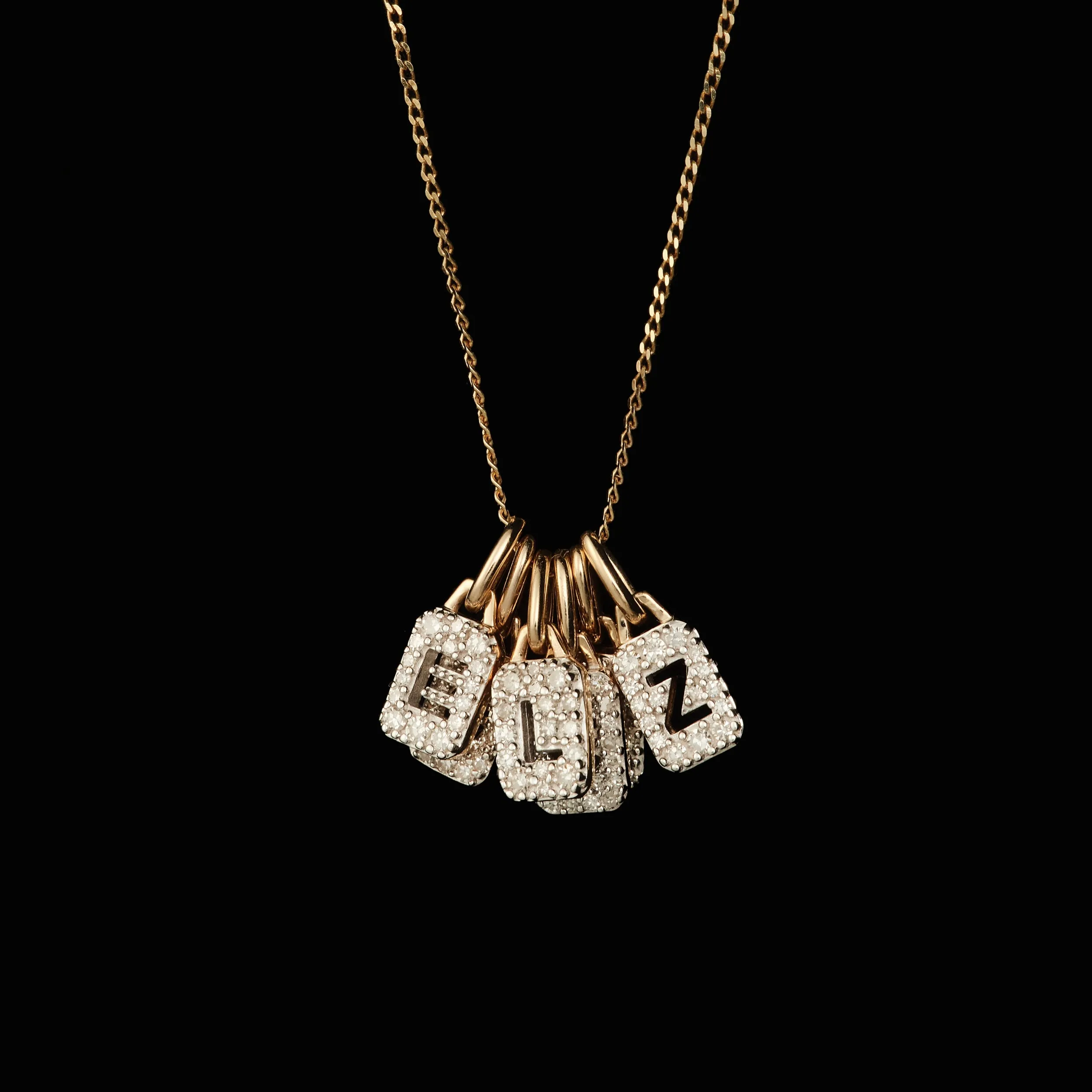 Tiny Diamond Initial Tag Pendant sold by Otiumberg product image thumbnail 3