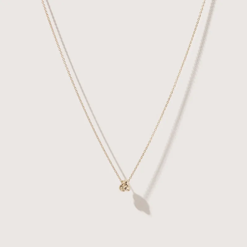 Mini Solid Gold Knot Necklace made by Otiumberg