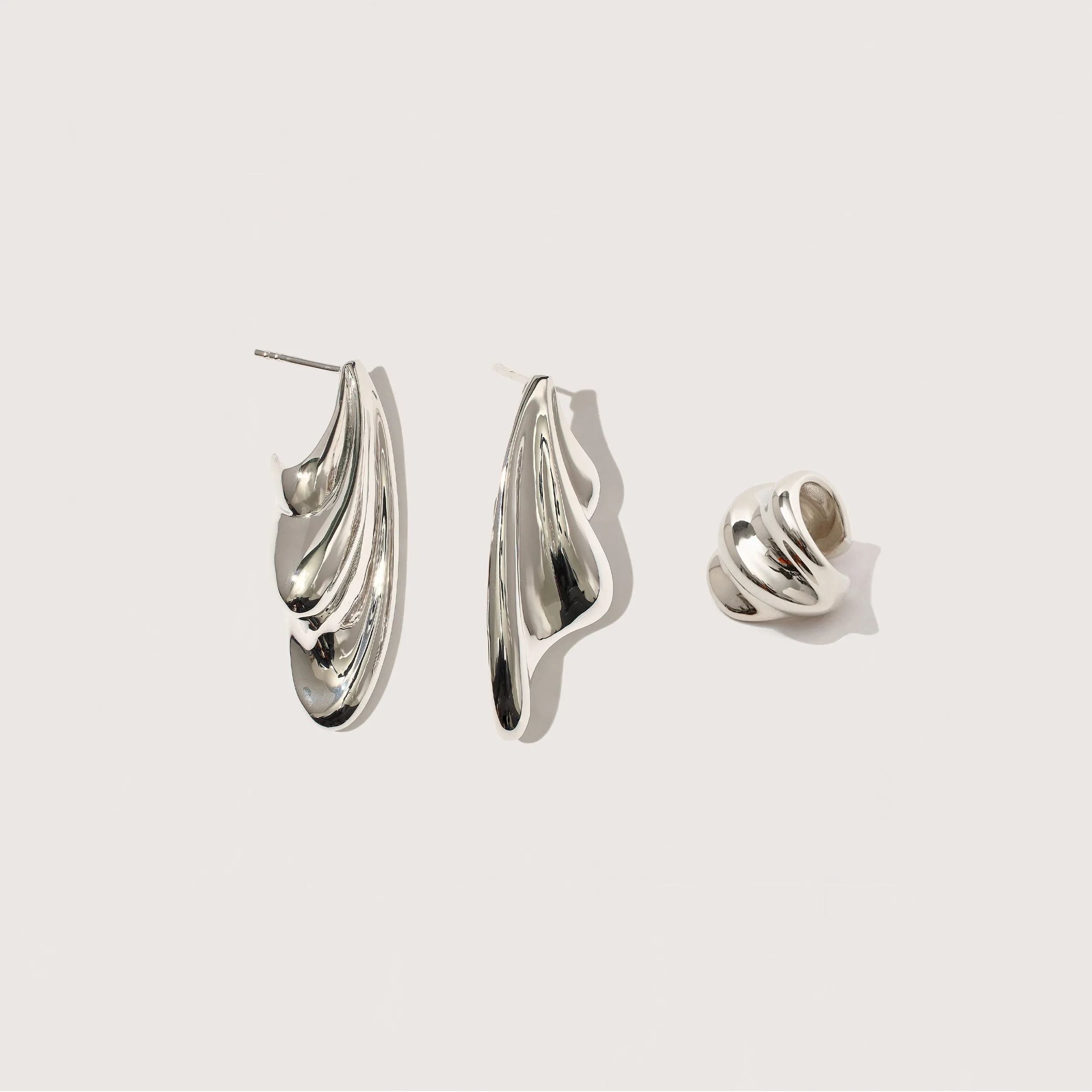 Statement Wave Earrings and Cuff Set sold by Otiumberg