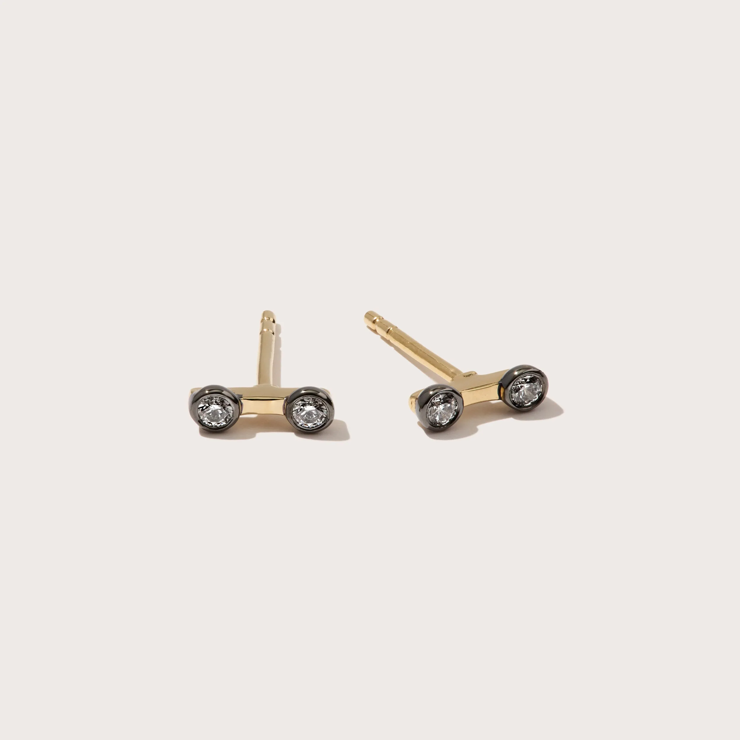 Midnight Diamond Bezel Bar Studs sold by Otiumberg