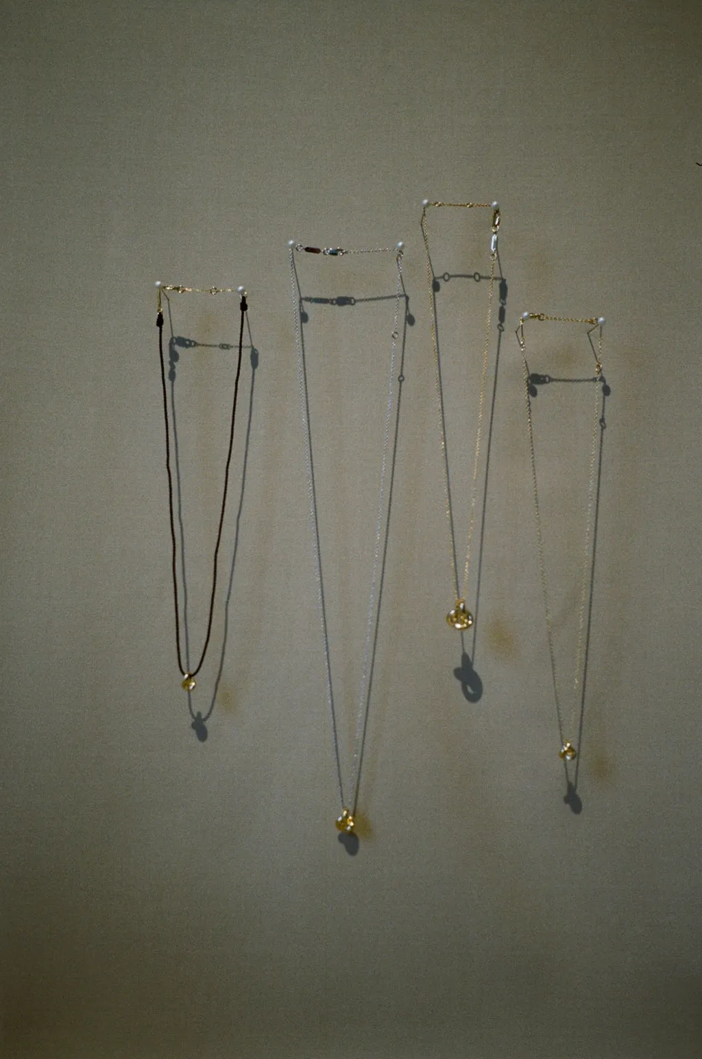 Mixed Metal Long Knot Necklace sold by Otiumberg product image thumbnail 5