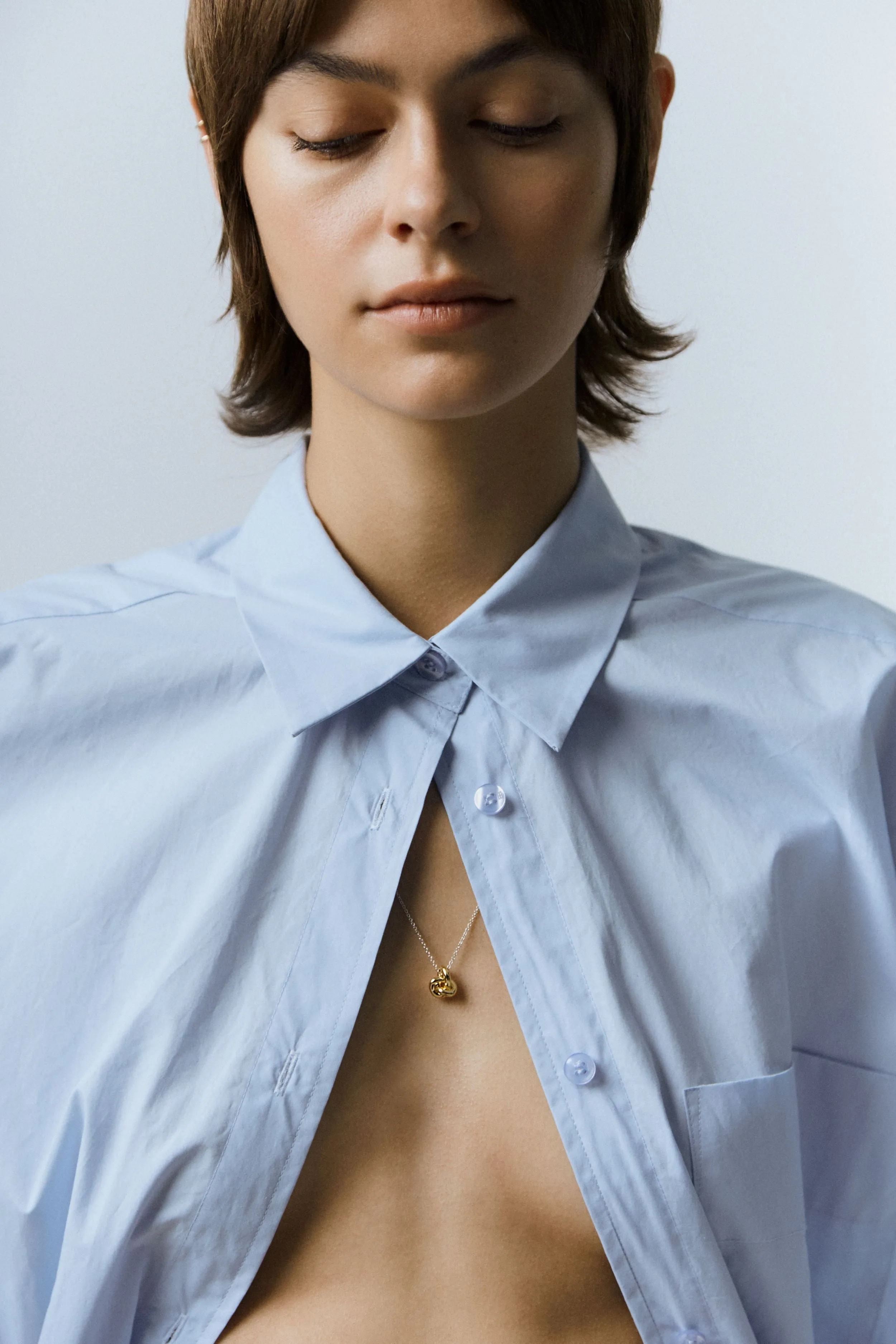 Mixed Metal Long Knot Necklace sold by Otiumberg product image thumbnail 3