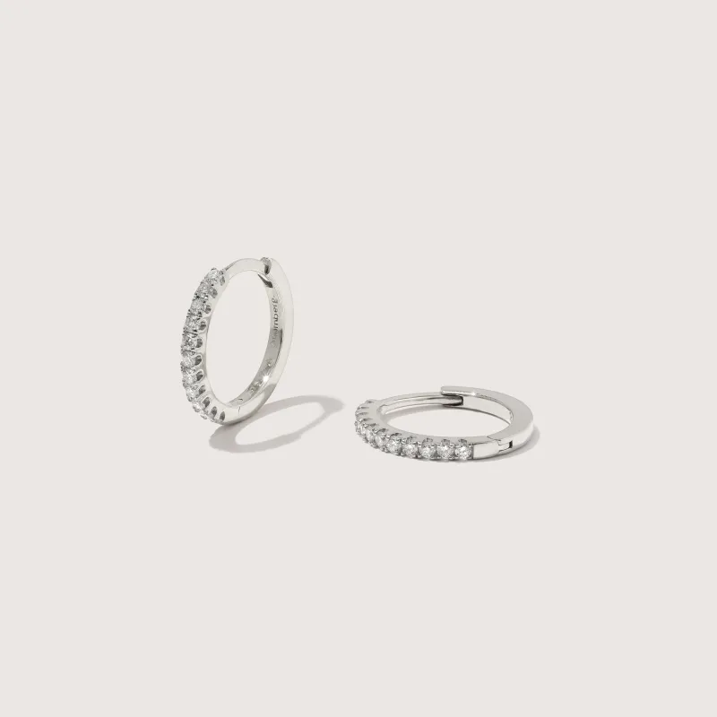 Large Solid White Gold Diamond Huggie Hoops made by Otiumberg
