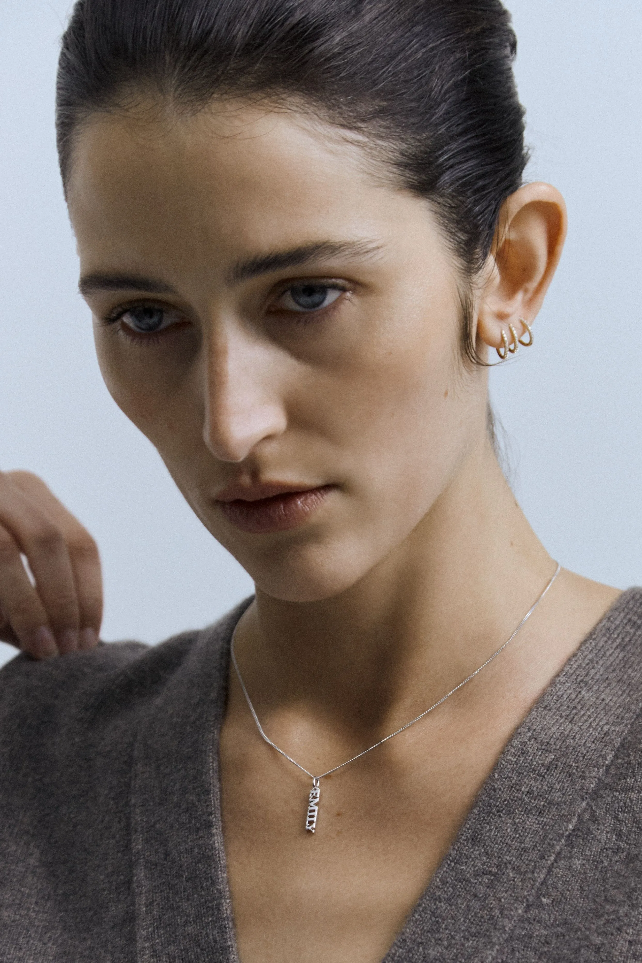 Mini Oval Hoops With White Topaz sold by Otiumberg product image thumbnail 2