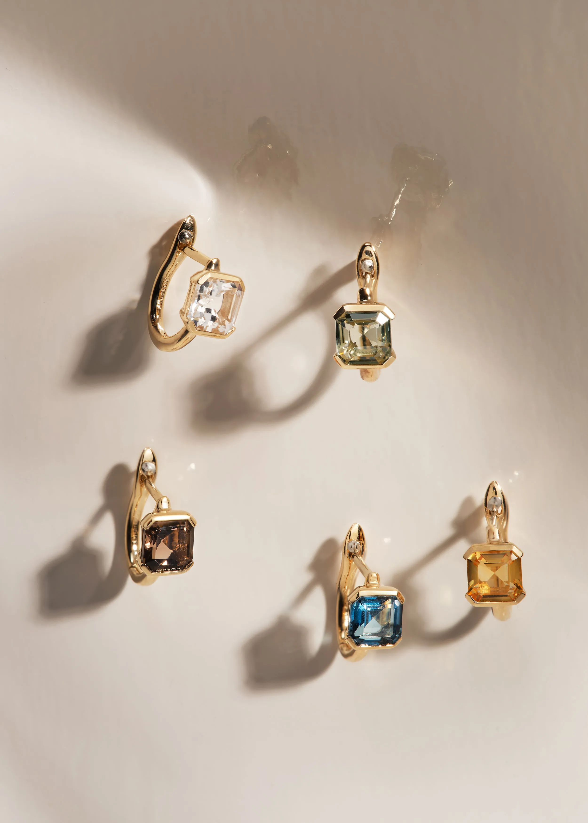 White Topaz Domino Huggie Hoops sold by Otiumberg product image thumbnail 5
