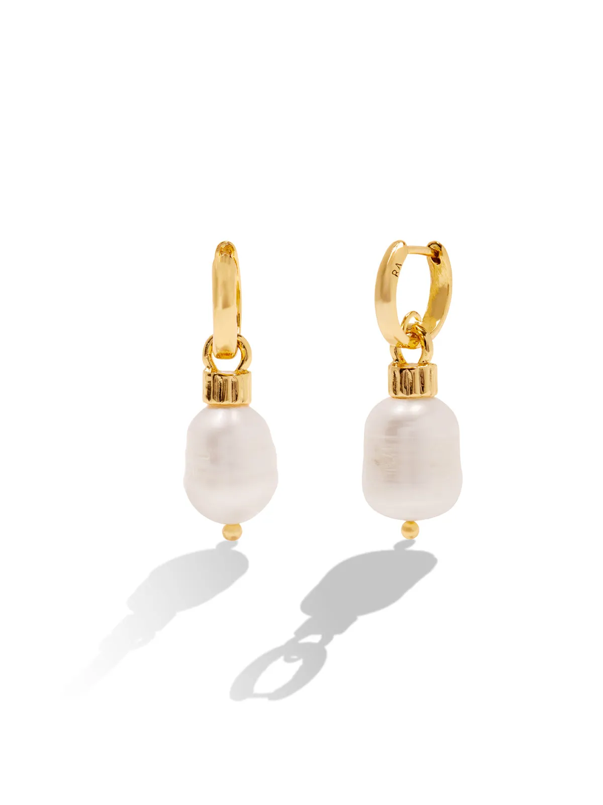 The Pearl Drop Earrings sold by YLANG23